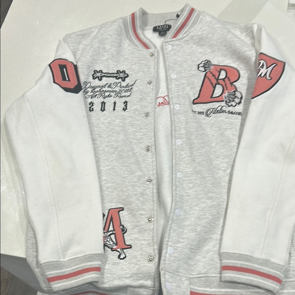 Gray and Red Varsity Jacket with Patches and Striped Trim